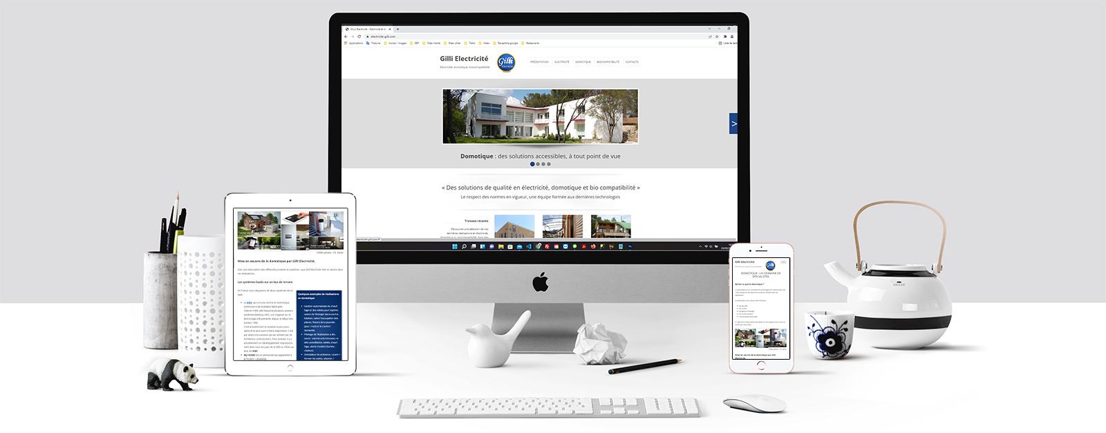Le site Gilli électricité sur un écran Mac, un écran de tablette et un écran d'Iphone