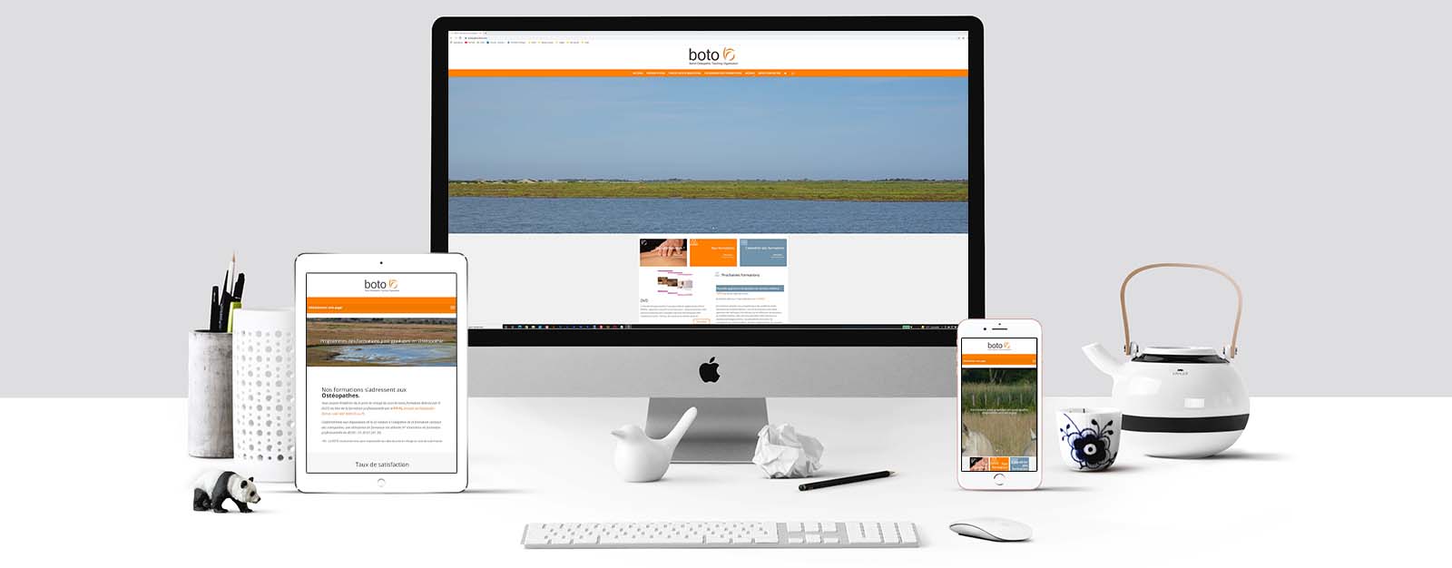 Boto Le site Boto sur un écran Mac, un écran de tablette et un écran d'Iphone