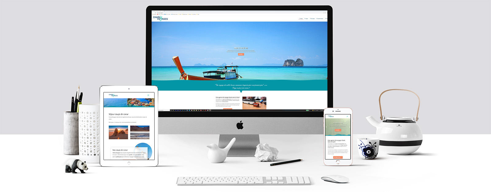 Le site de Charly Voyages sur un écran Mac, un écran de tablette et un écran d'Iphone
