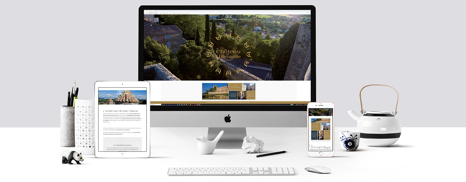 Le site du Château de Villevieille sur un écran Mac, un écran de tablette et un écran d'Iphone
