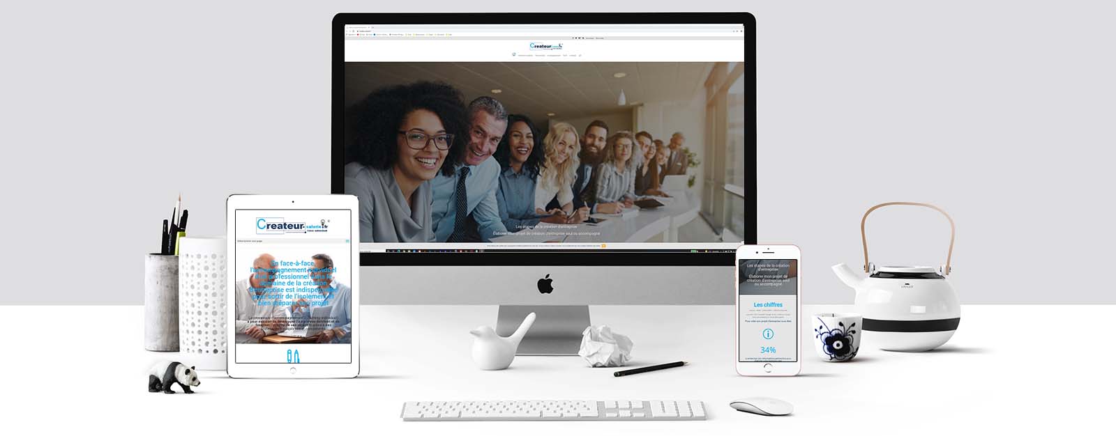 Le site Créateur salarié sur un écran Mac, un écran de tablette et un écran d'Iphone
