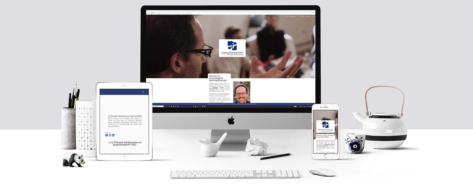 Le site de Guillaume Poupard sur un écran Mac, un écran de tablette et un écran d'Iphone