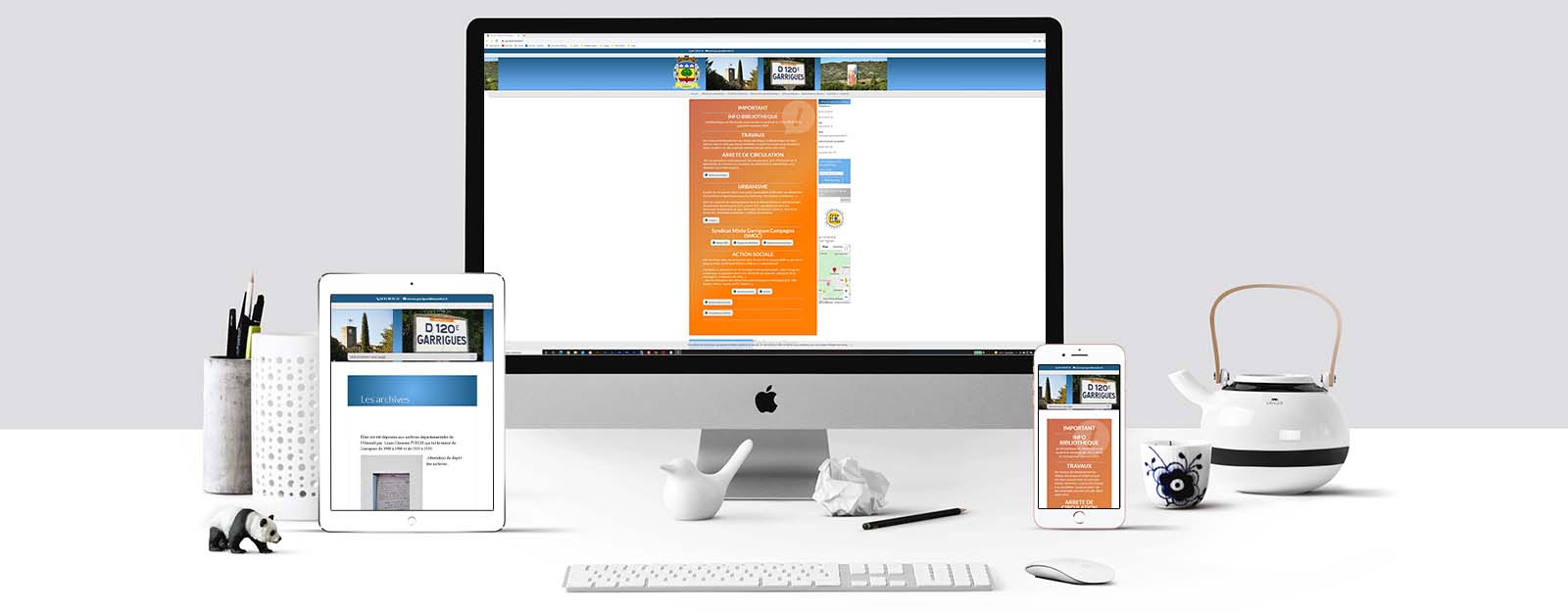 Le site de la mairie de Guarrigues sur un écran Mac, un écran de tablette et un écran d'Iphone