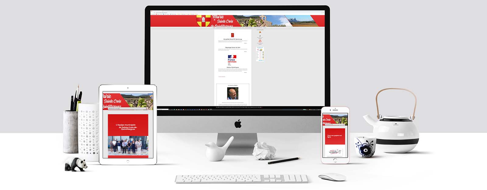 Le site de la mairie de Sainte-Croix-de-Quintillargues sur un écran Mac, un écran de tablette et un écran d'Iphone