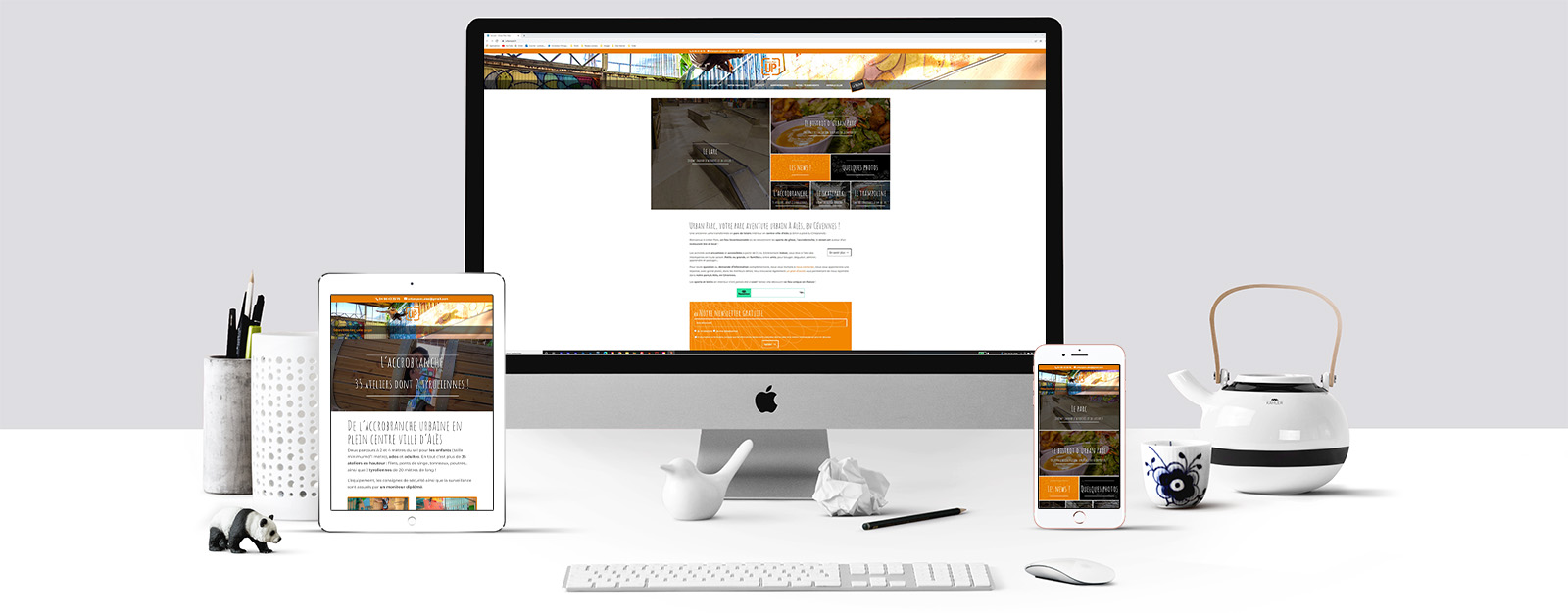 Le site d'Urban Parc sur un écran Mac, un écran de tablette et un écran d'Iphone