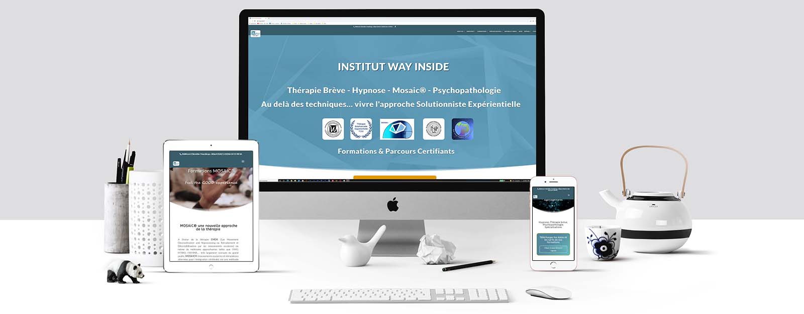 Le site de Way Inside sur un écran Mac, un écran de tablette et un écran d'Iphone